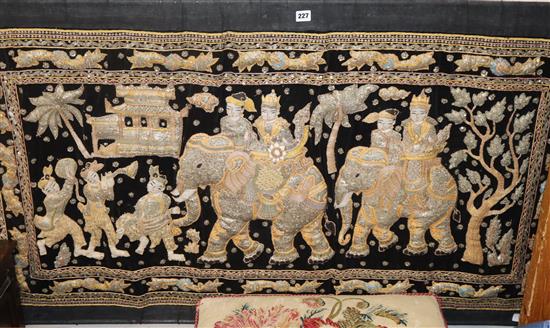 An Indian figural velvet and sequin applique panel